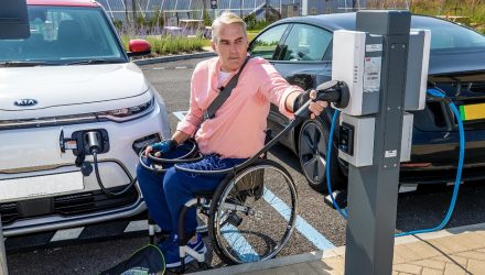 Man in wheelchair at charging point