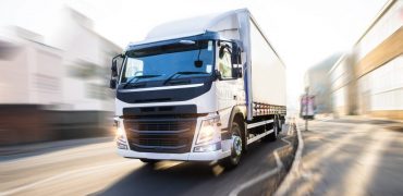 White Truck in motion isolated with clipping path