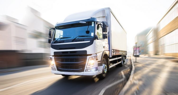 White Truck in motion isolated with clipping path