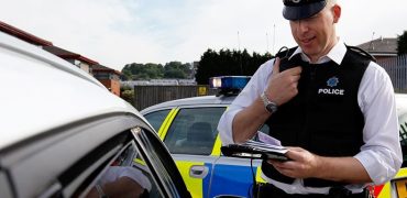 Policeman checking documents