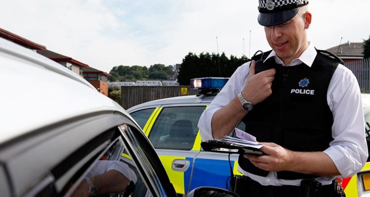 Policeman checking documents