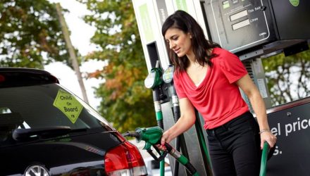 Woman filling up her car