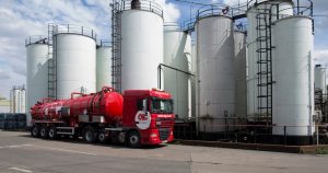 CSG Tanker beside fuel storage tanks