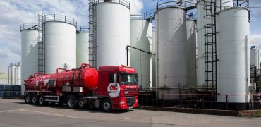 CSG Tanker beside fuel storage tanks