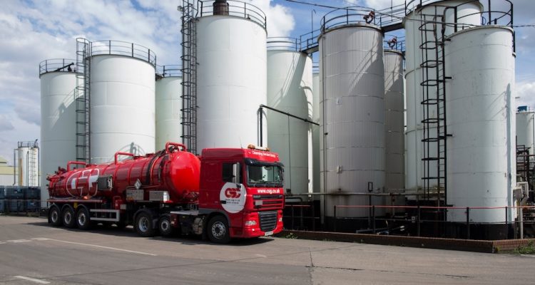 CSG Tanker beside fuel storage tanks