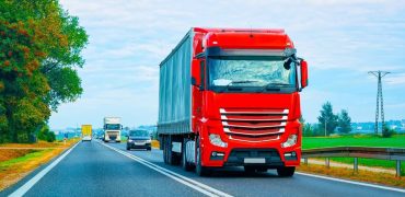 Red lorry on a road