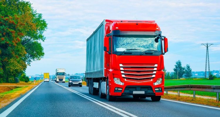 Red lorry on a road