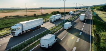 Highway Transit photo with Convoy of transportation trucks