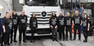 Employees at Sparshatt Truck & Van wearing t-shirts with inspirational quotes at their Sittingbourne depot.
