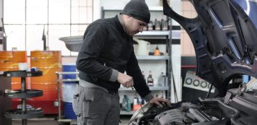 Mechanic checking an engine