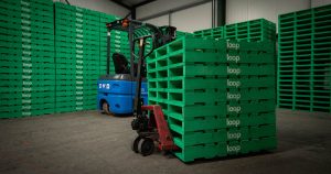 Green LOOP pallets in a warehouse