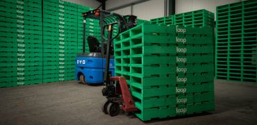 Green LOOP pallets in a warehouse