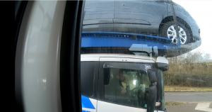 Using elbow to steer car transporter