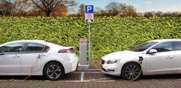 Two electric cars being charged