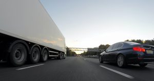 Car overtaking an HGV on the motorway