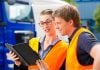 HGVC trainee and Instructor looking at an app