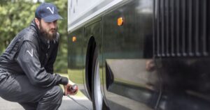 Engineer inspecting a Volta Truck
