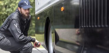 Engineer inspecting a Volta Truck