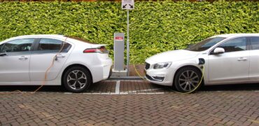 Two cars at a charging station