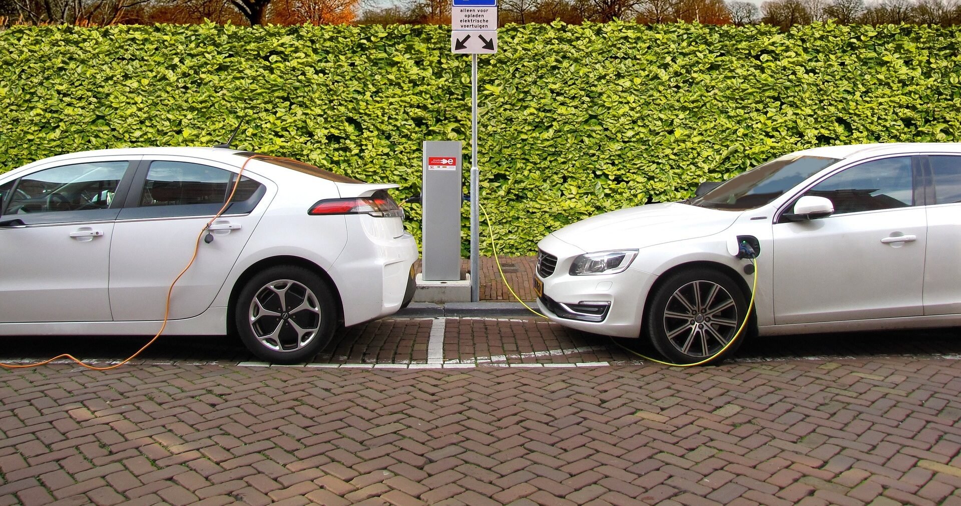Two cars at a charging station