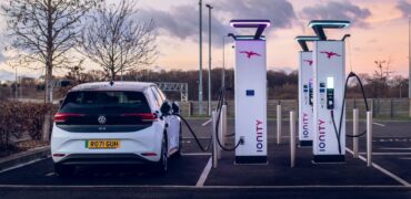 Car being charged up at a public charging point
