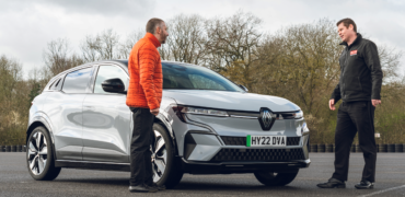 RED driving instructor checking tyres