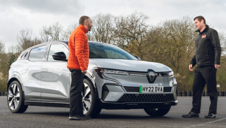 RED driving instructor checking tyres