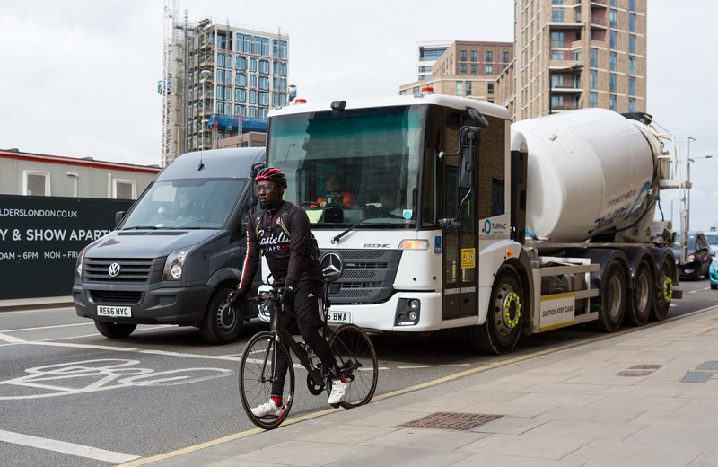 Direct Vision Standard cyclist and cement mixer on the road