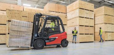 Reversing forklift with people in the way