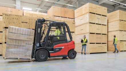 Reversing forklift with people in the way