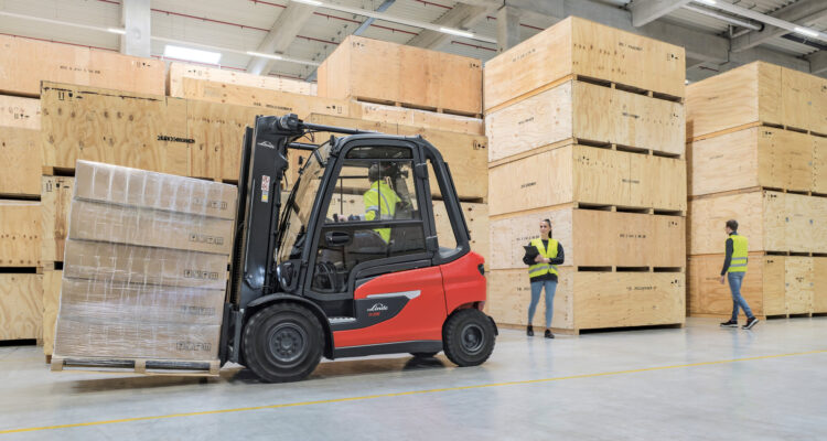 Reversing forklift with people in the way