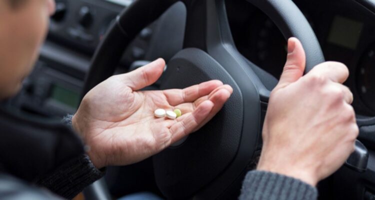 Driver about to take some tablets