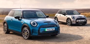 Two electric Mini Coopers