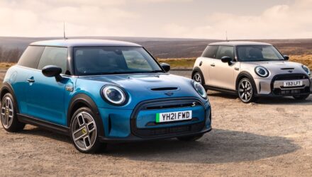 Two electric Mini Coopers