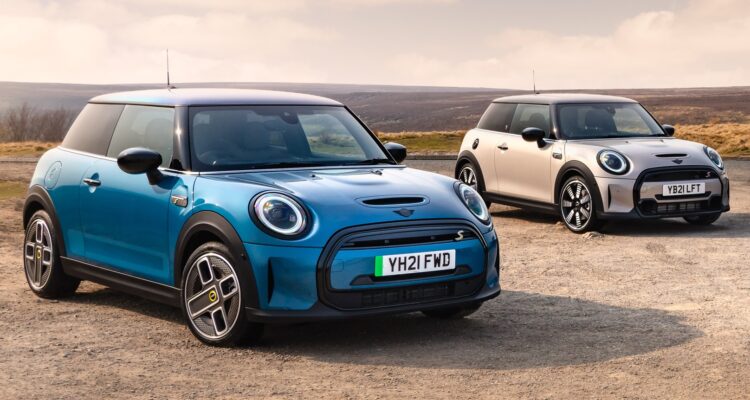 Two electric Mini Coopers