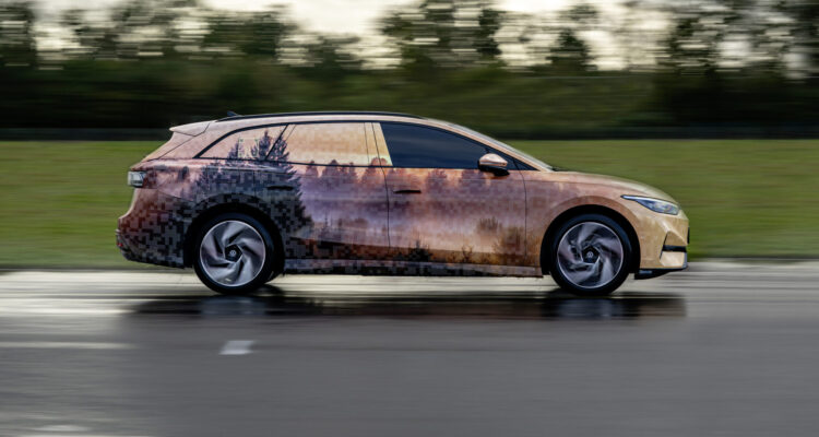 The still-camouflaged ID.7 with hatchback.