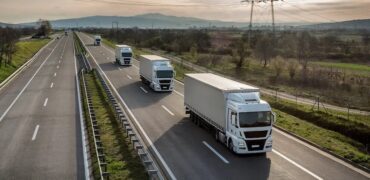 Fleet of trucks on a motorway