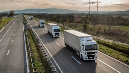 Fleet of trucks on a motorway