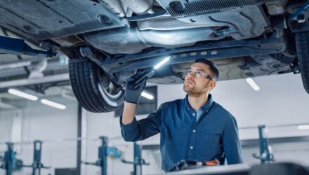 Inspecting the underside of a car