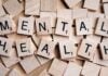 Scrabble tiles spelling out Mental Health