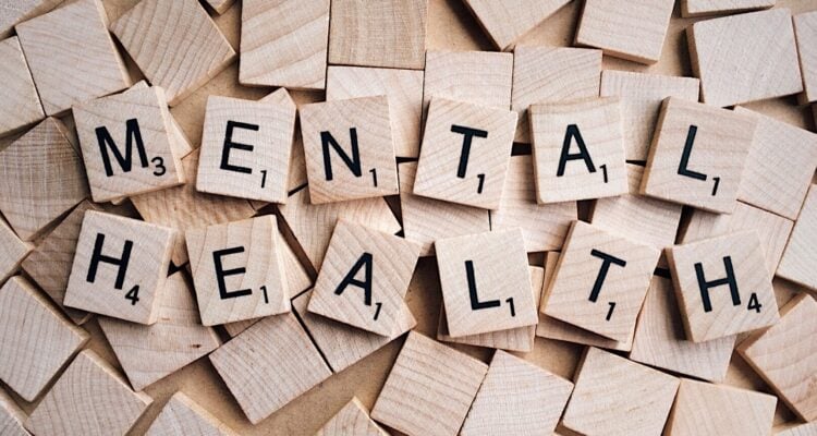 Scrabble tiles spelling out Mental Health
