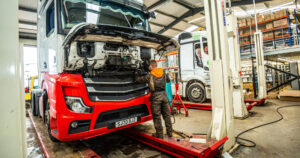 Mechanic working on a Mercedes-Benz truck