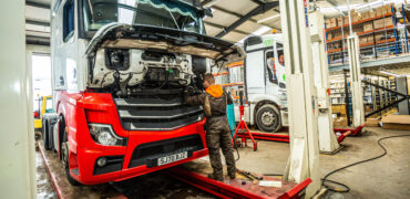 Mechanic working on a Mercedes-Benz truck