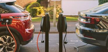 Connected Kerb two cars being charged