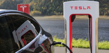 Tesla car being charged up