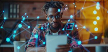 Man working on an AI powered laptop