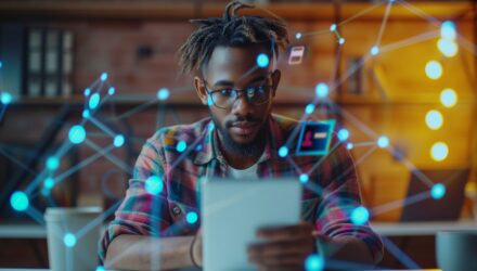 Man working on an AI powered laptop