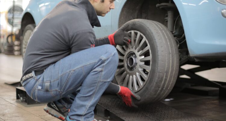 Man changing a car tyre