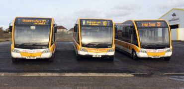 A row of Shuttle Buses