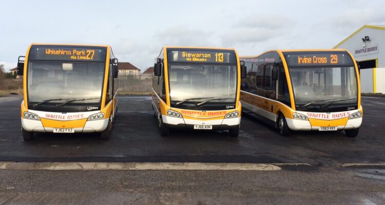 A row of Shuttle Buses